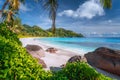 Lonely couple on beautiful exotic Anse Intendance beach on Mahe island, Seychelles