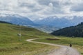 Lonely cyclist in the mountains of Kyrgyzstan