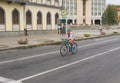 Lonely cyclist on Yavornytskyi Avenue at summer weekend in Dnepr city