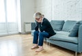 Senior widow woman lonely and sad feeling depressed at home Royalty Free Stock Photo