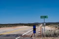 Road sign for Panaca Nevada 20 miles away. Cattle guard on the highway Royalty Free Stock Photo
