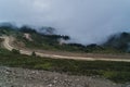 Lonely desert road in the mountains Royalty Free Stock Photo