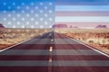 Lonely and deserted american road, superimposed USA flag, into the desert of monument valley Royalty Free Stock Photo