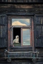 Lonely Dog Looking Through His Window Royalty Free Stock Photo