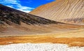Lonely dry empty hot desert valley, dry salt crust, sun burnt sand hill - Coridillera de Copiapo, Atacama, Chile