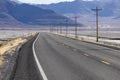 Lonely empty highway stretching for miles into the desert Royalty Free Stock Photo