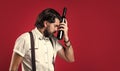 lonely evening. bartender. stylish male barman. drinking wine glass. bearded man in suspenders drink red wine. elegant Royalty Free Stock Photo