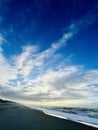 Lonely expanses on the beach, with the last rays of the day