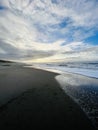 Lonely expanses on the beach, with the last rays of the day