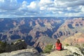 Lonely female enjoying the beautiful view of the Grand Canyon National Park in Arizona, USA