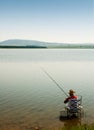 Lonely fisherman Royalty Free Stock Photo