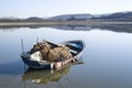 Lonely fishing boat in lake with reflection Royalty Free Stock Photo