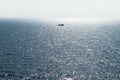 Lonely fishing ship trawler boat on ocean