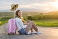 Lonely girl sitting on the road Royalty Free Stock Photo