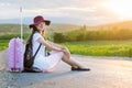 Lonely girl sitting on the road Royalty Free Stock Photo