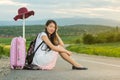 Lonely girl sitting on the road Royalty Free Stock Photo