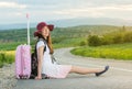 Lonely girl sitting on the road Royalty Free Stock Photo