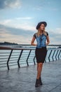 Lonely girl standing on the pier Royalty Free Stock Photo