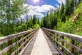 Lonely Hiker on a Mountain Path and Blue Sunny Sky Royalty Free Stock Photo