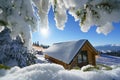 Lonely house covered with snow on top of the mountain Royalty Free Stock Photo