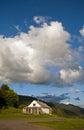 A lonely house on the mountain in the clouds Royalty Free Stock Photo