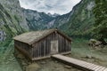 Lonely Hut in a Mountain Lake during Cloudy Weather