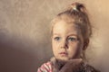 Lonely innocence scared child girl looking frightened with worried sight Royalty Free Stock Photo