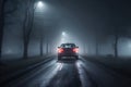 Lonely Journey A Solitary Car Battles Through the Fog on an Eerie, Desolate Road