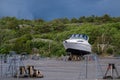 Lonely laid up boat at a marina lay up site.. Royalty Free Stock Photo