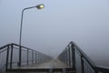 and stairs in the fog pedestrian bridge Royalty Free Stock Photo