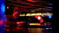 Lonely man bored at bar counter, browsing social media, lack of communication Royalty Free Stock Photo