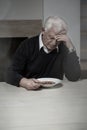 Lonely man eating soup Royalty Free Stock Photo