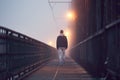Lonely man on the old bridge Royalty Free Stock Photo