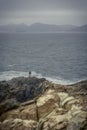 Lonely man by the sea in Hong Kong