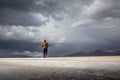 Solo man walking on the Bolivian salt flats in Uyuni Royalty Free Stock Photo