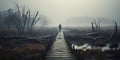A lonely man walks on an abandoned nature boardwalk. Misty and foggy scenery