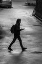 Man wallking alone on the street Royalty Free Stock Photo