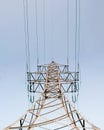 Lonely metal mast power lines with wires standing vertically. Royalty Free Stock Photo
