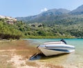 Lonely motor boat on the lakeside Royalty Free Stock Photo