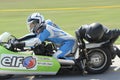 Lonely motorbike sidecar in the left turn on the track.