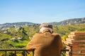 Old man looking at the beautiful landscape in Frigiliana