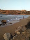 Lonely person at the empty beach Royalty Free Stock Photo