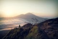 Rising sun over mountain above clouds Royalty Free Stock Photo