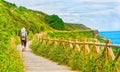 Lonely Pilgrim with backpack walking the Camino de Santiago in S