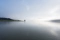 Lonely pine tree reflection on the lake at dawn part 7 Royalty Free Stock Photo