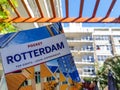 Lonely Planet travel guide book of Rotterdam with architecture in the background