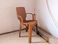 A Lonely Plastic Chair In The Corner Of Room Royalty Free Stock Photo