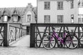 Lonely purple bike standing in the typical street in Stockholm