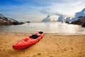 Lonely red kayak at the tropical beach Royalty Free Stock Photo