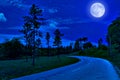 Lonely road in the country at night Royalty Free Stock Photo